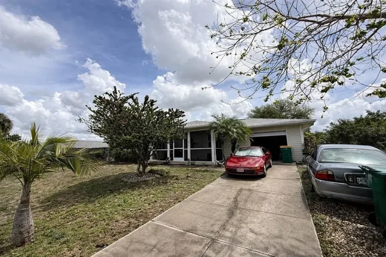 913 Tropical Cir NW, Port Charlotte, FL 33948 sold by John Colin & Co.